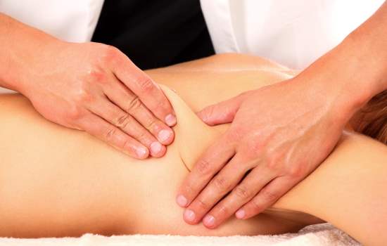 A picture of a physio therapist giving a back massage